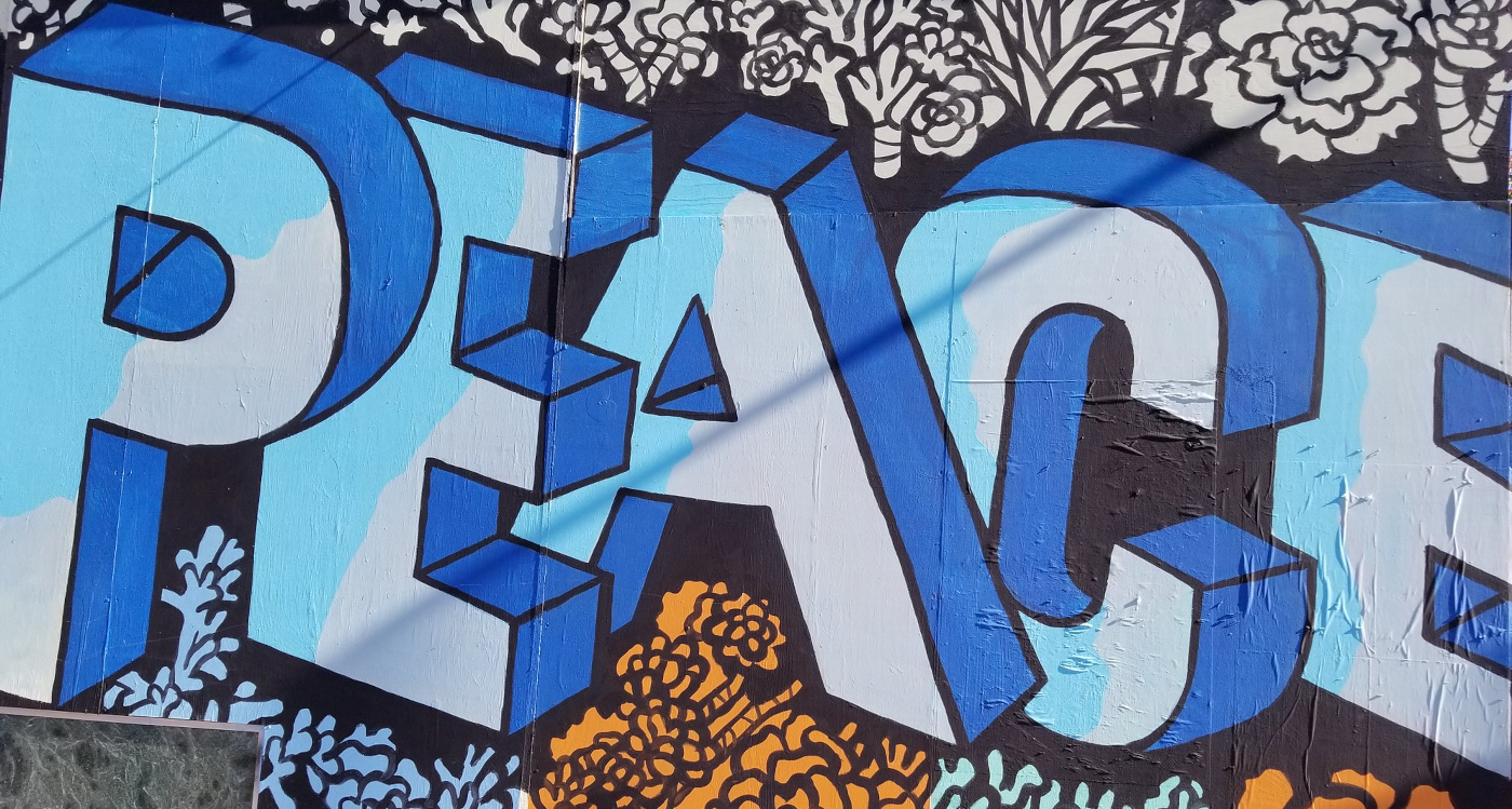 graffiti that says "peace"